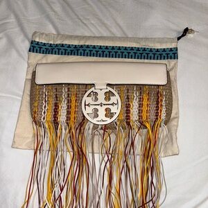 Authentic Tory Burch straw fringe clutch.